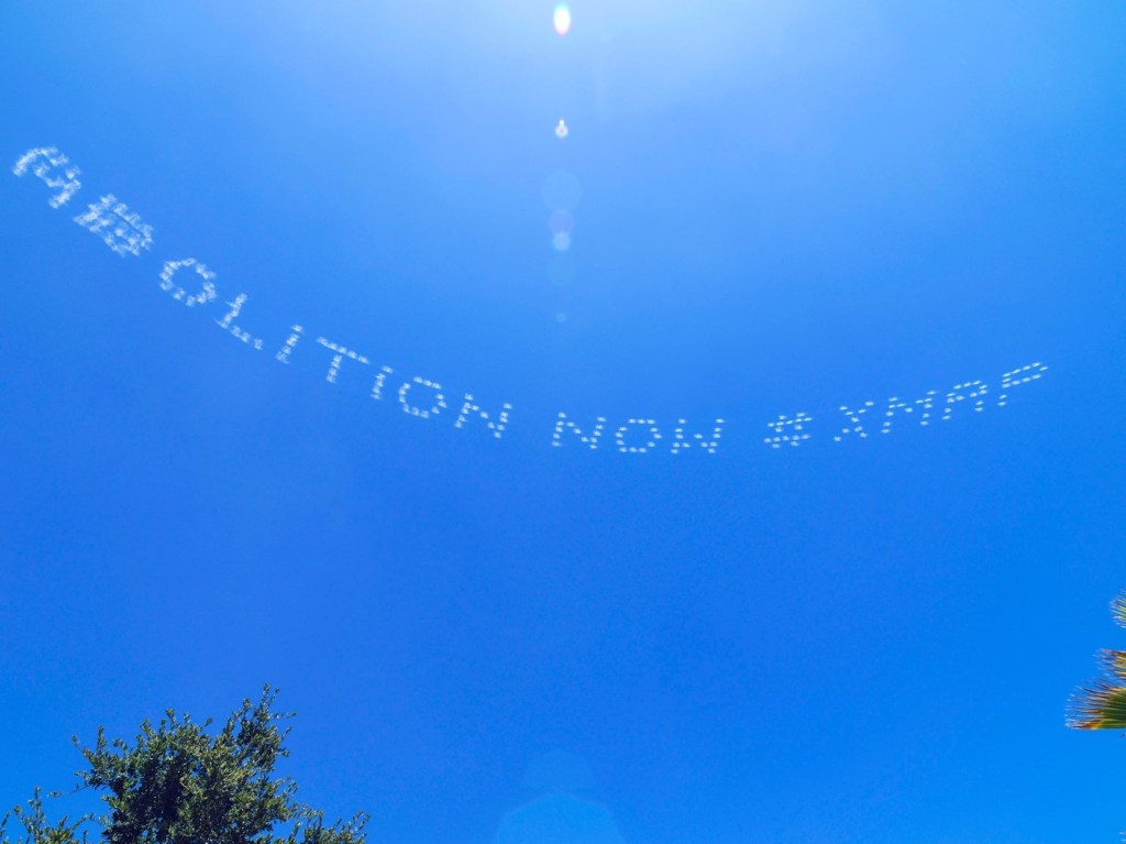 Image of Gonzales-Day's "Abolition Now" in Sky-Typing